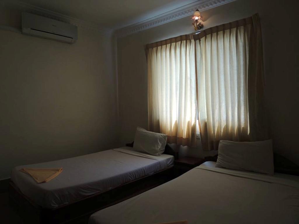 Shang Hai pensión Battambang Habitación foto